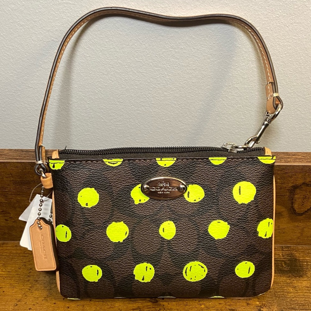 NWT Coach wristlet- Signature product